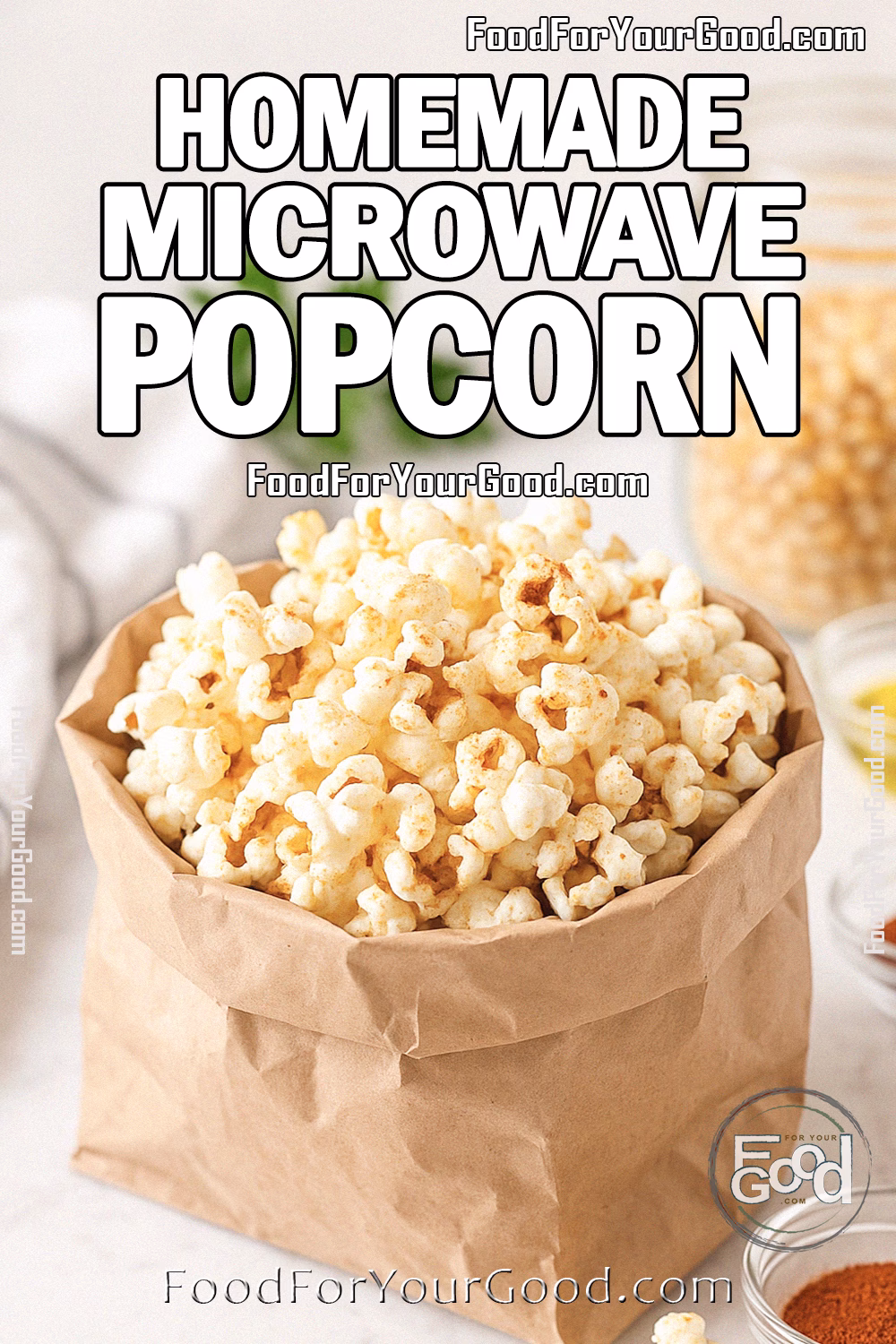 Homemade Microwave Popcorn Recipe – FoodForYourGood.com Homemade microwave popcorn served in a brown paper bag on a marble countertop with olive oil, paprika, and popcorn kernels in the background on FoodForYourGood.com