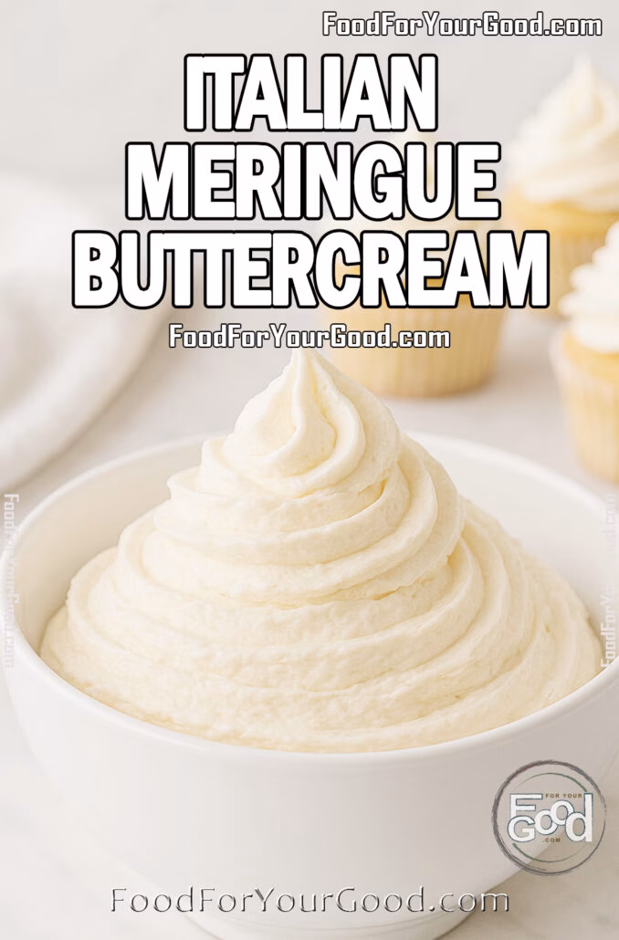 Italian Meringue Buttercream Italian Meringue Buttercream in a white ceramic bowl on a marble surface with frosted cupcakes in the blurred background.