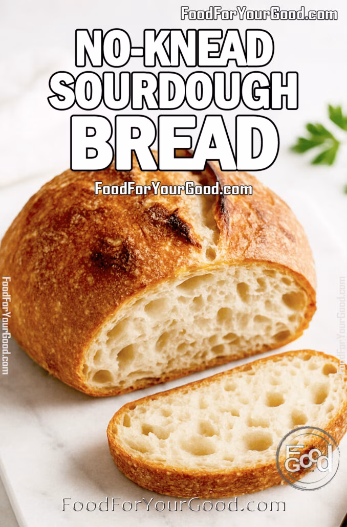 No-Knead Sourdough Bread with rustic uneven crust and open crumb on a white marble tray, daylight, and parsley blurred.