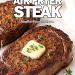 Perfectly Juicy Air Fryer Steak topped with melting butter and fresh thyme on FoodForYourGood.com