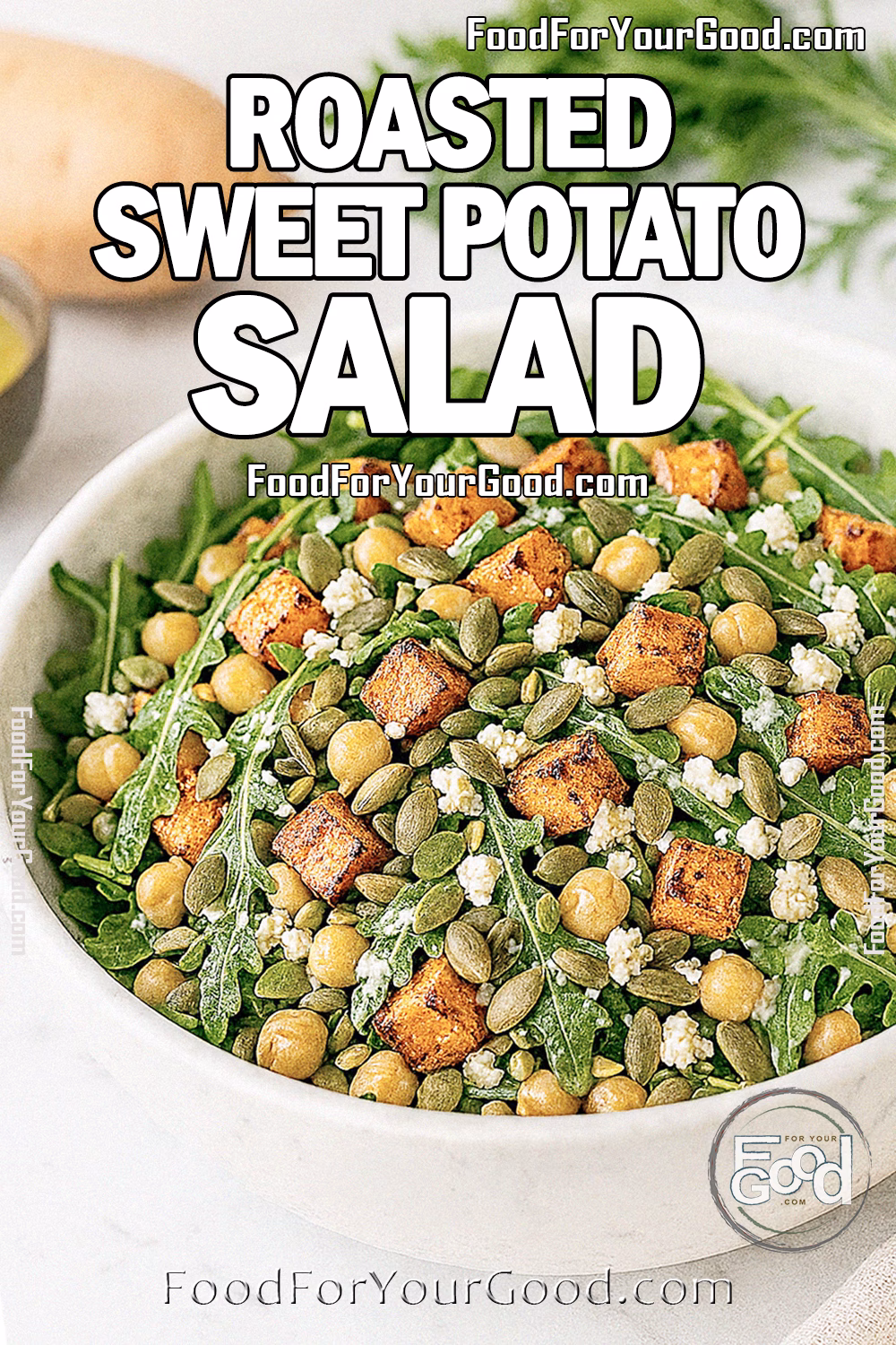 Roasted Sweet Potato Salad Recipe | FoodForYourGood.com Roasted Sweet Potato Salad with arugula, chickpeas, feta, and pumpkin seeds served in a white marble bowl on FoodForYourGood.com