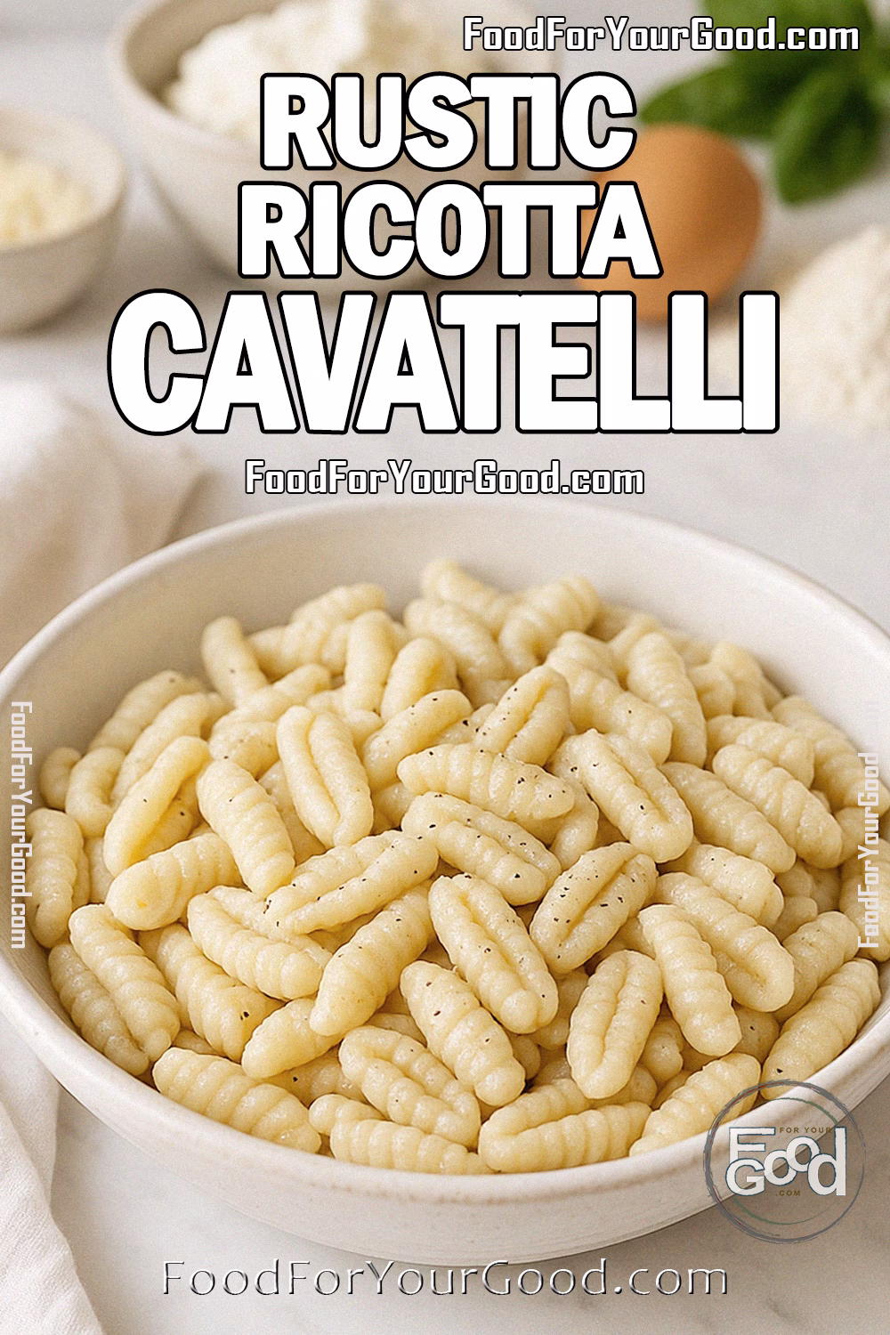 Rustic Ricotta Cavatelli Recipe – FoodForYourGood.com Rustic Ricotta Cavatelli in a white ceramic bowl on a marble countertop, with fresh ricotta, egg, flour, Parmesan, and basil blurred in the background, alongside a folded white towel.