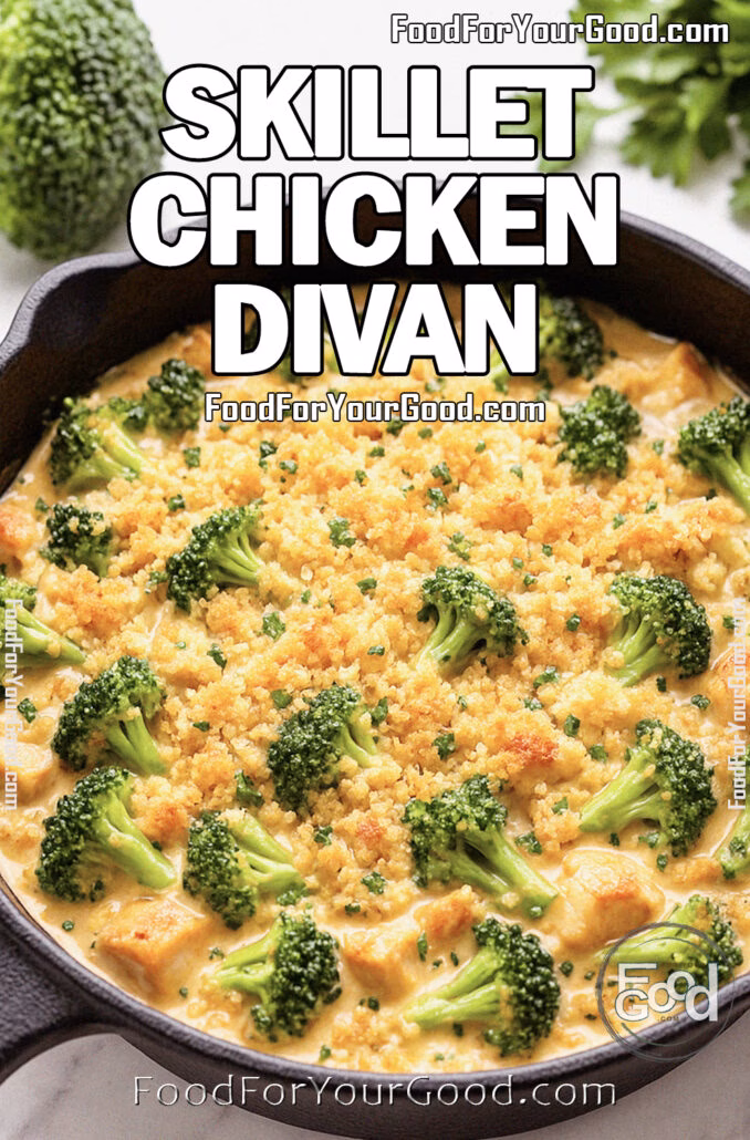 Skillet Chicken Divan with golden breadcrumb topping, tender chicken, and broccoli in creamy cheddar sauce on marble.