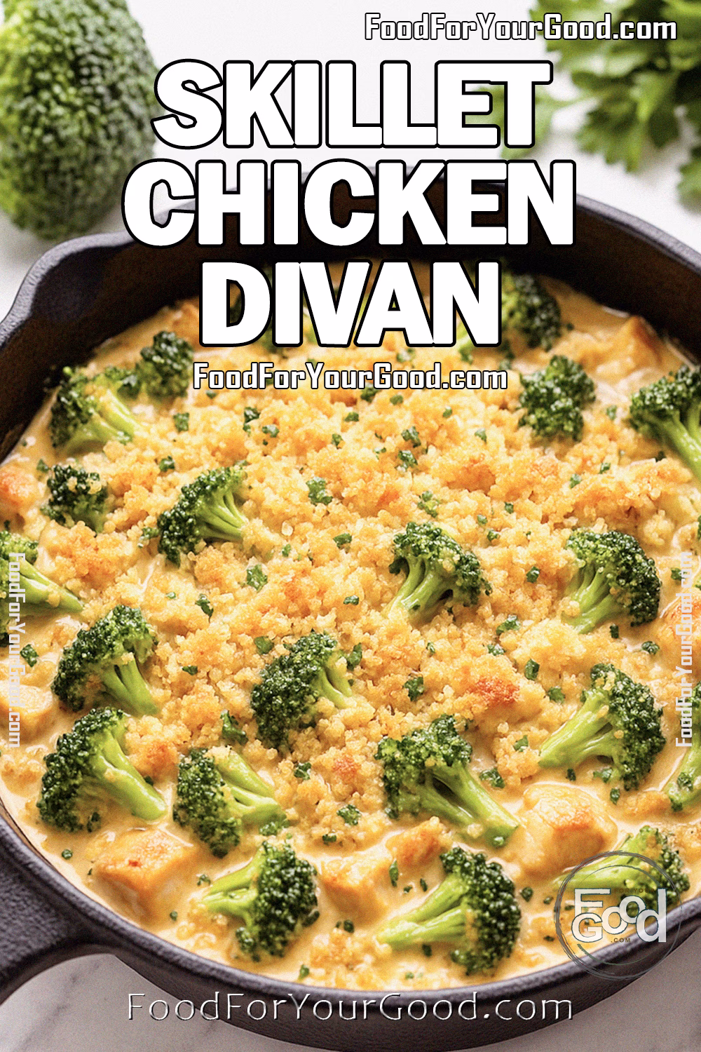Skillet Chicken Divan with golden breadcrumb topping, tender chicken, and broccoli in creamy cheddar sauce on marble.