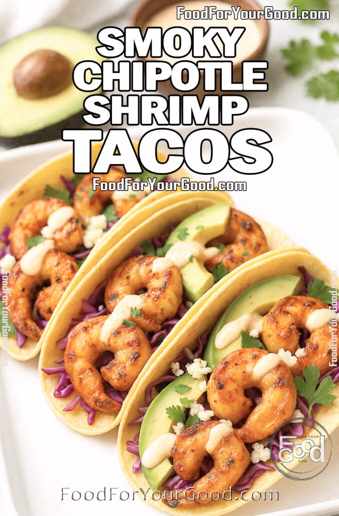 Smoky Chipotle Shrimp Tacos Smoky Chipotle Shrimp Tacos with avocado, red cabbage, cotija cheese, and chipotle-lime crema on a white rectangular plate from FoodForYourGood.com