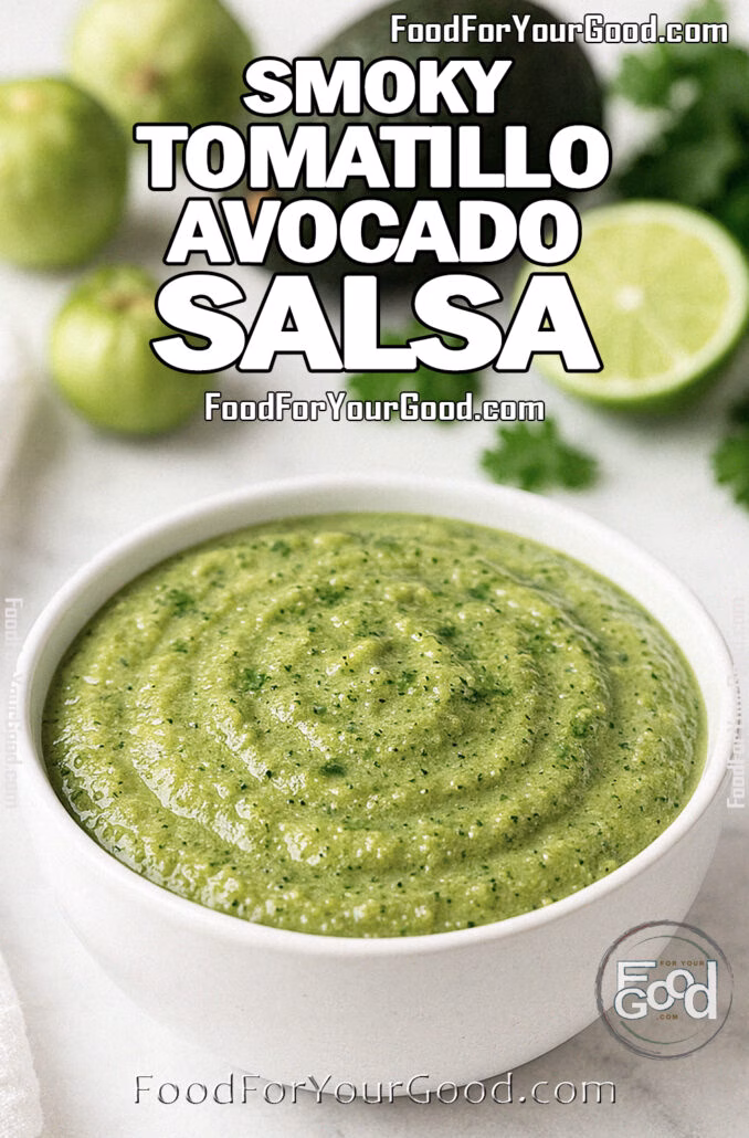 Smoky Tomatillo Avocado Salsa A bowl of Smoky Tomatillo Avocado Salsa on a white marble countertop, with fresh tomatillos, avocado, lime, cilantro, and a white towel in the background.