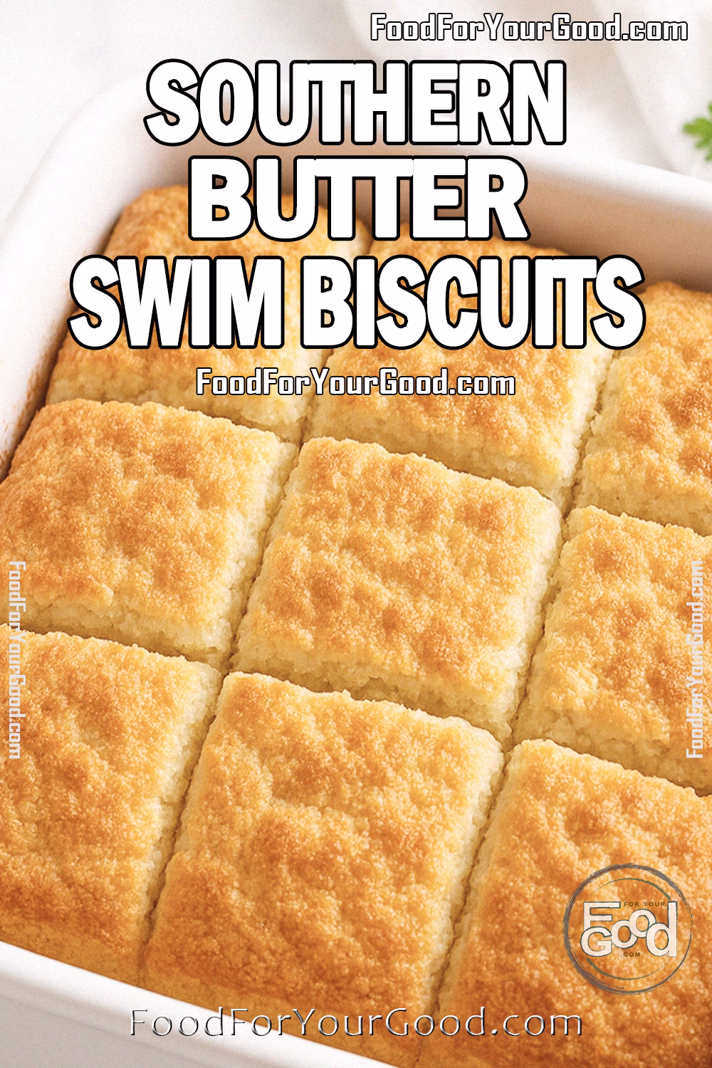 Southern Butter Swim Biscuits Recipe - FoodForYourGood.com Southern Butter Swim Biscuits baked golden brown in a white ceramic dish, cut into squares, styled with a white towel and fresh parsley in the background.