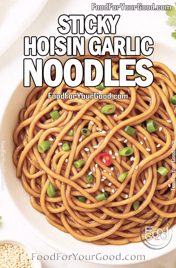 Sticky Hoisin Garlic Noodles_PIN Sticky Hoisin Garlic Noodles topped with sesame seeds, scallions, and red chili in a white bowl on marble.