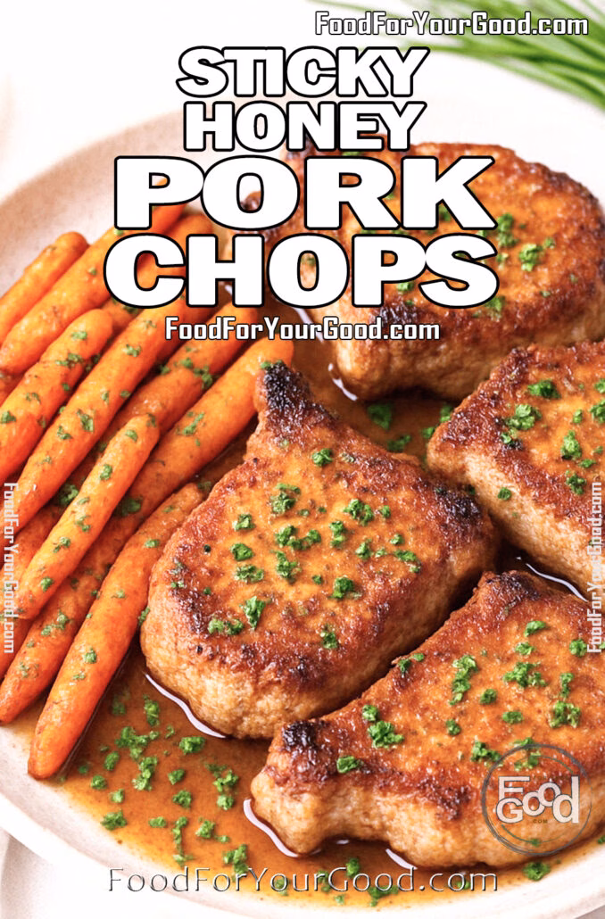 Sticky Honey Pork Chops with caramelized baby carrots on a rustic ceramic plate
