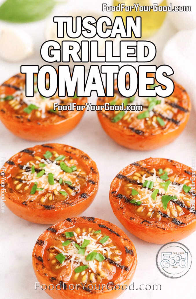 Tuscan Grilled Tomatoes Tuscan Grilled Tomatoes on a white marble background, topped with parmesan and basil, served with olive oil, garlic, and cheese in the background.