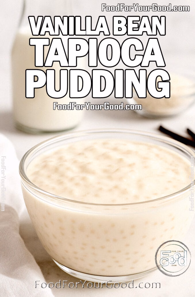Vanilla Bean Tapioca Pudding in a glass bowl on marble countertop with milk, tapioca pearls, and vanilla beans in the background.