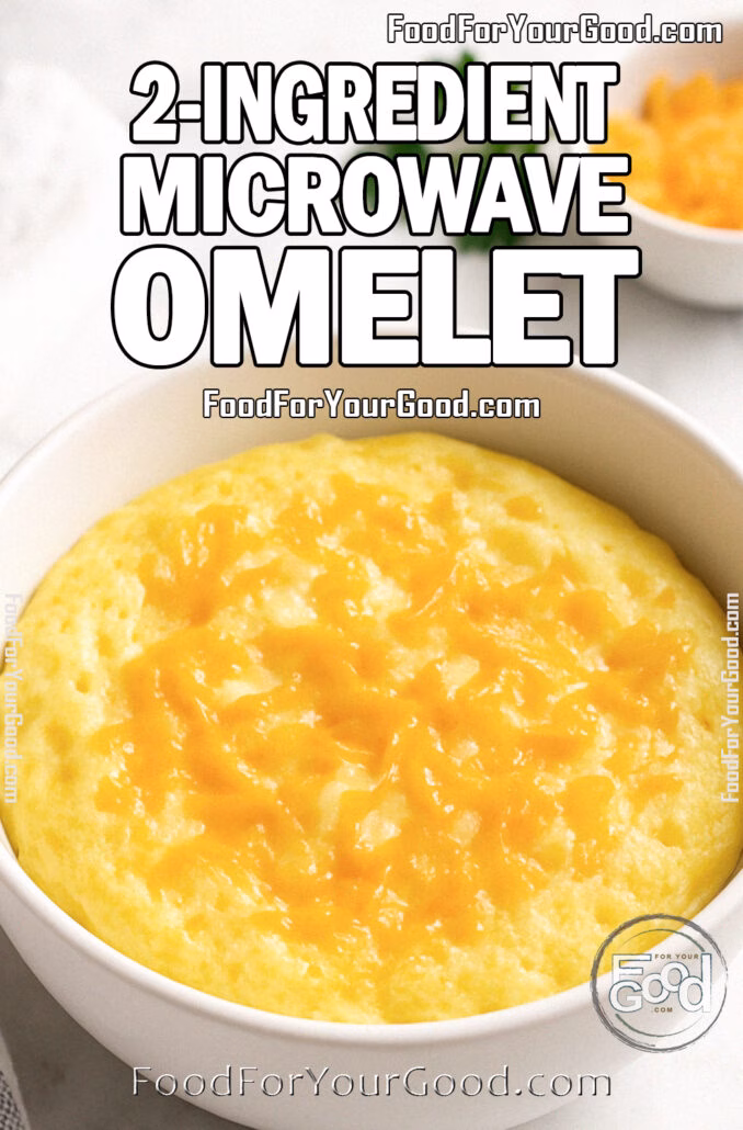 Fluffy 2-Ingredient Microwave Egg Omelet with melted cheddar cheese, served in a white bowl on a marble background – FoodForYourGood.com