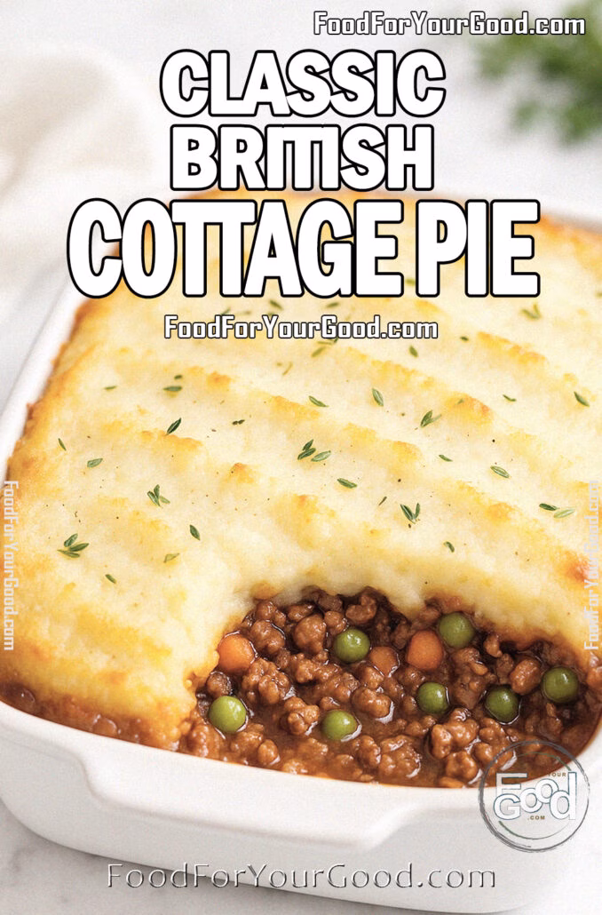 Classic British Cottage Pie baked in a white ceramic dish with rustic mashed potato topping, golden at the edges. A portion is scooped out, revealing savory beef, peas, and carrots filling beneath.