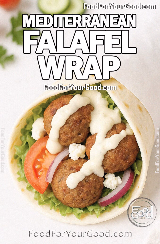 Homemade Mediterranean Falafel Wrap with crispy falafel, fresh veggies, feta, and tahini sauce, wrapped in parchment on a marble surface, featured on FoodForYourGood.com