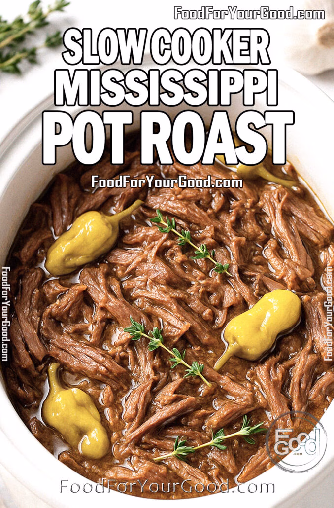 Slow Cooker Mississippi Pot Roast Slow Cooker Mississippi Pot Roast in a white slow cooker with tender shredded beef, pepperoncini, butter, and thyme on a white marble background.