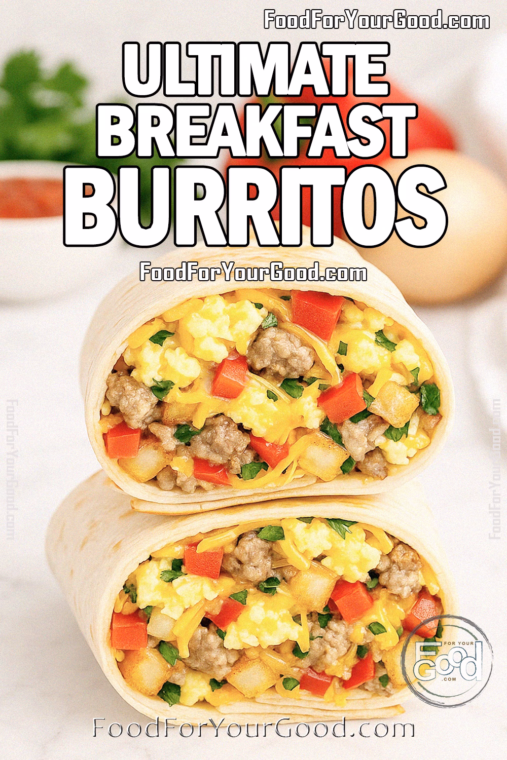 Ultimate Breakfast Burritos Recipe | FoodForYourGood.com Ultimate Breakfast Burritos cut in half, stacked on a white marble surface, filled with fluffy scrambled eggs, sausage, crispy hash browns, melted cheese, and peppers, with salsa, cilantro, and a red bell pepper in the blurred background.