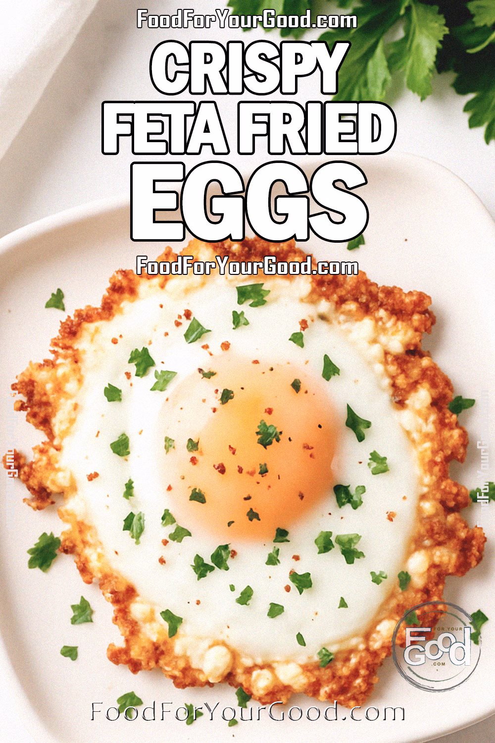 Crispy Feta Fried Eggs on a white plate with golden, lacy feta edges and fresh parsley garnish, photographed on a marble surface in bright daylight on FoodForYourGood.com.